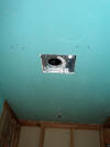Ceiling with opening for exhaust and spout for shower head